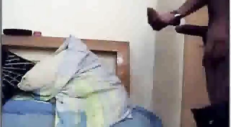 Indian girl performing a belly dance for her room mates shaking her belly