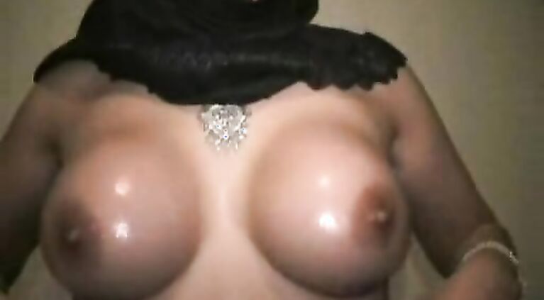 Amateur indian housewife sharimara removing her bra, playing with her big juicy boobs.