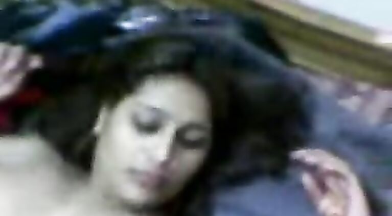 Young Pakistani housewife Nazia from Karachi in red sari stripping naked for sex with her man.