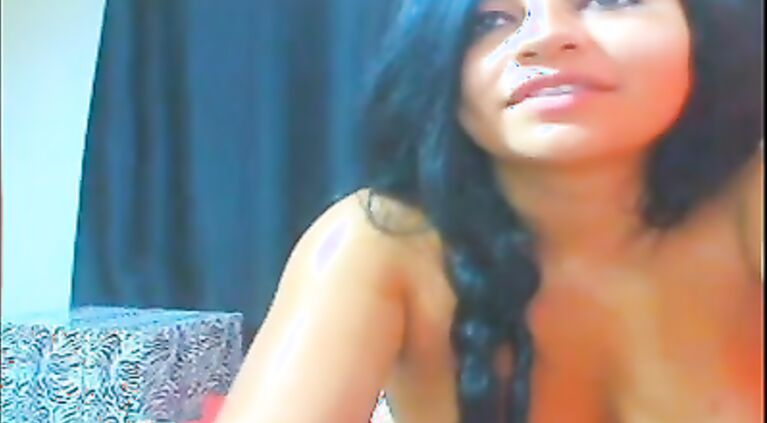 Esha Mohana UK indian babe masturbating with her big dildo on a webcam fucking herself off.