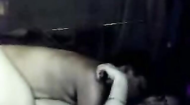 riding her hubby condom covered cock in this MMS