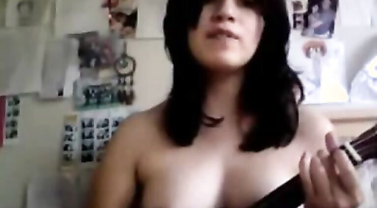 Gorgeous topless Indian girl on live sex chat playing guitar and exposing herself off!.