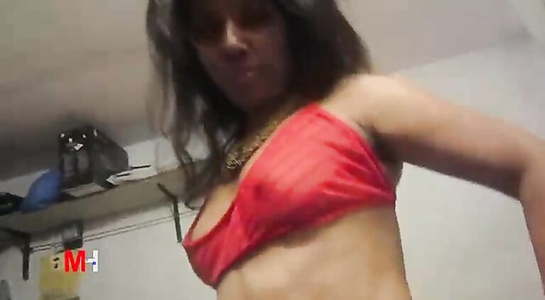 B-grade indian model Kalpana erotic photo session in sexy outfits in a studio.