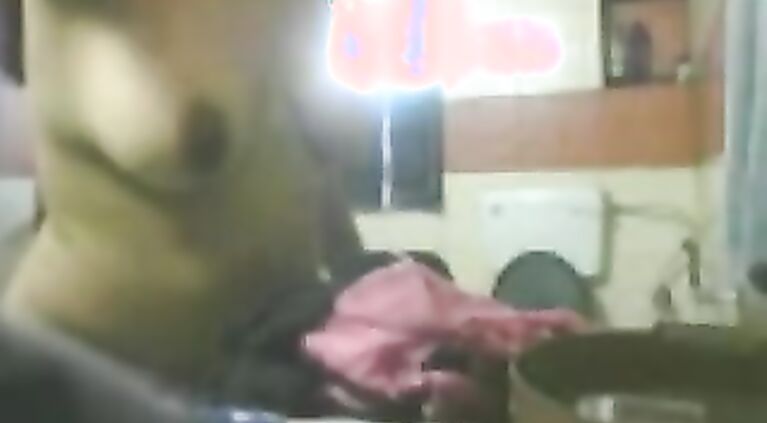 Mature desi bhabhi in bathroom stripping naked unaware of hidden cam being fixed by her dewar to record her naked.