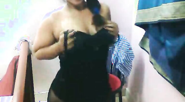 Busty desi babe Lilly in blue shirt and in stockings doing a self recorded strip show leaked online!.