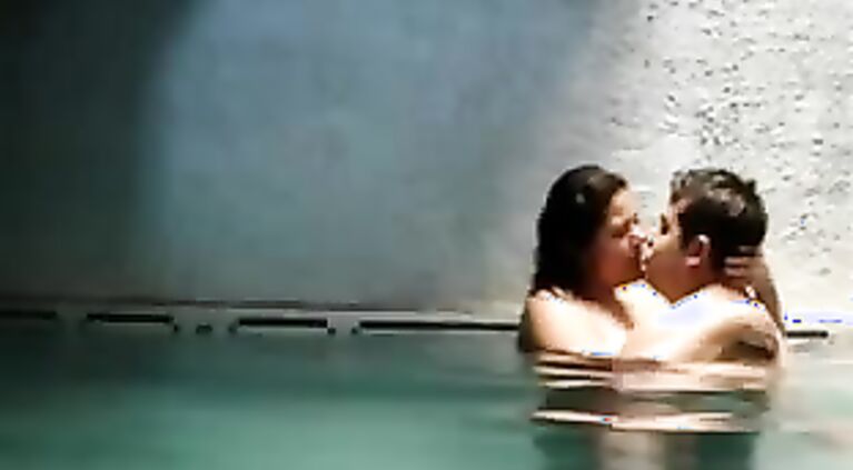 Newly married Indian couple on their honeymoon in Mauritius hotel swimming pool getting naughty.