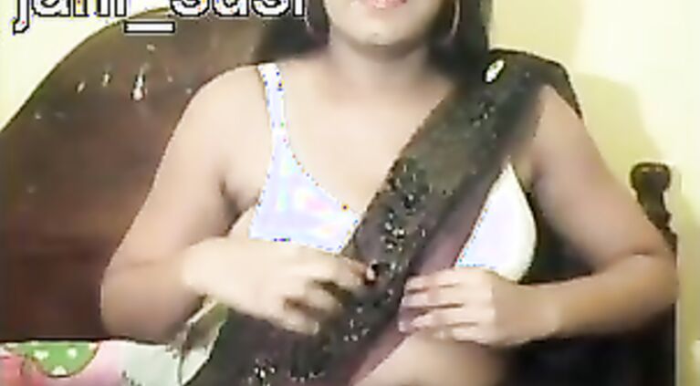 Indian bhabhi changing bra in open while her friend is helping her to hook it back during pilgrimage