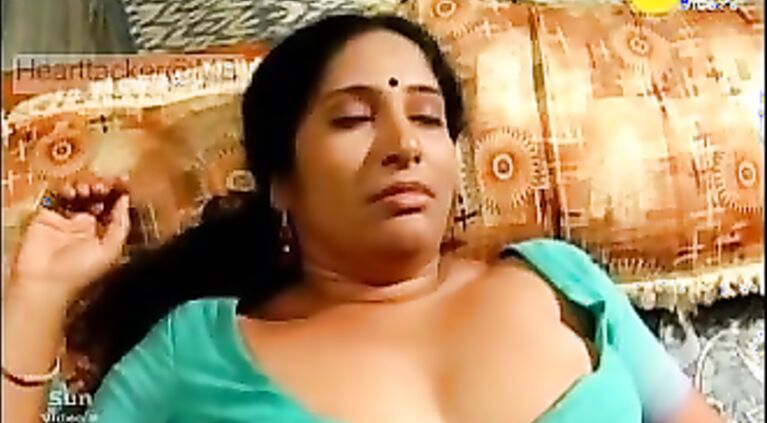 An amateur indian couple spend time together enjoying each other's company and watching a porno totally unaware of the camera