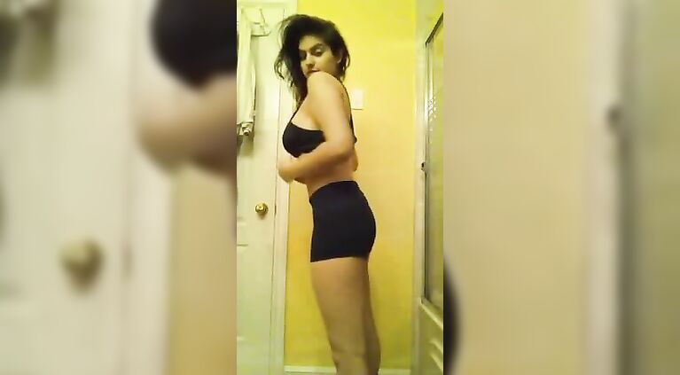 Beautiful Indian Teen with big tits stripping.