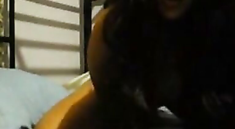 Desi girl playing with a toy on webcam.
