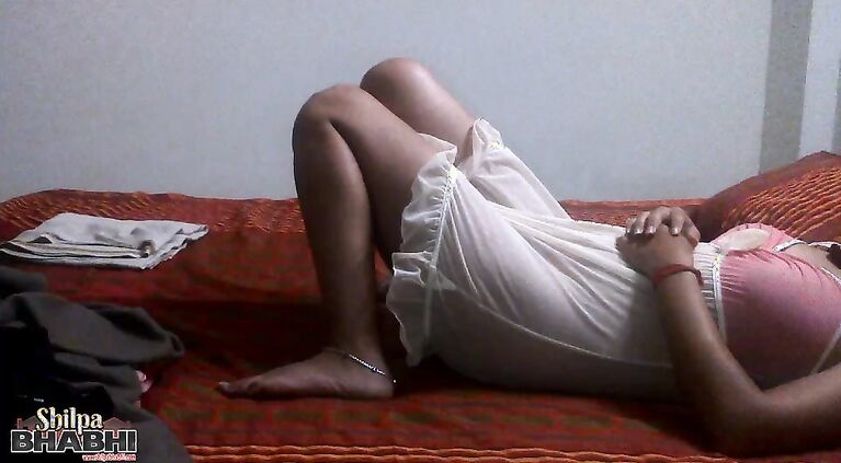 A magical bum administers a powerful aphrodisiac to a local housewife (Shilpa) when they have a hot casual encounter in a bedroom.