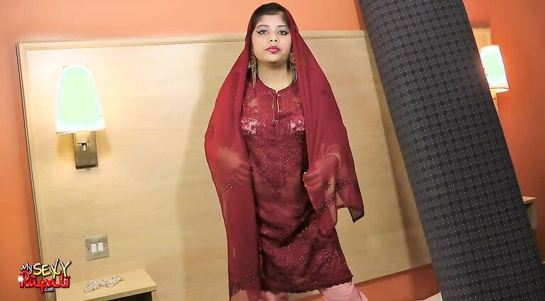 Rupali gujarati amateur gives a seductive strip tease giving her guy a peak under shalwar suit with her bountiful breast gyrating to the music