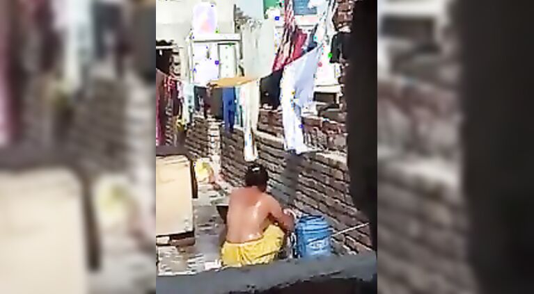 Aunty Bathing Topless in Terrace..