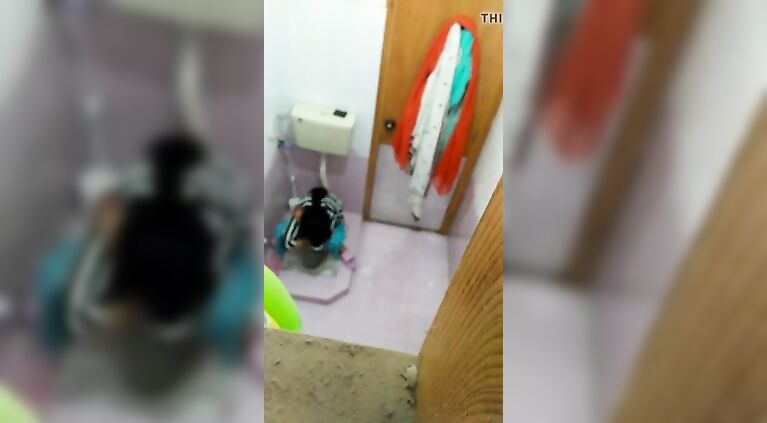 My cousin getting pee in washroom