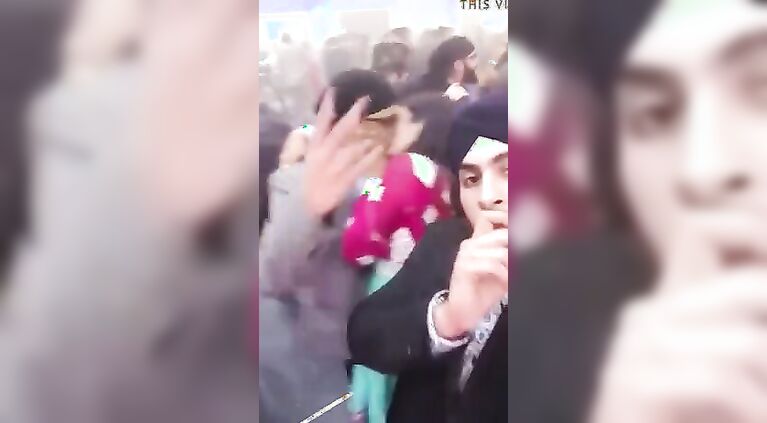 punjabi boys having fun with a girl in public