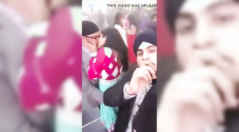 punjabi boys having fun with a girl in public