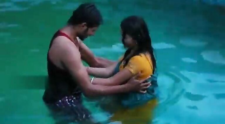 Lovers beautiful romance in swimming pool