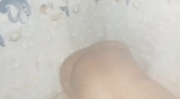 Village Indian aunty had a lot of fun by massaging her penis after bath.