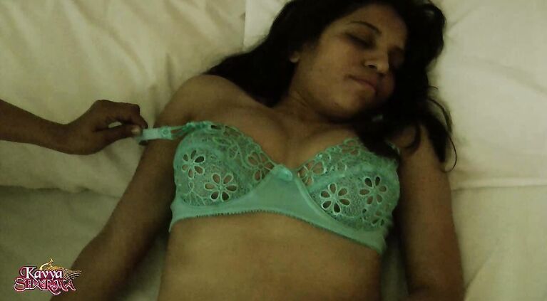 She slides her lingerie to the side and spreads her pretty pink pussy lips open wide for you.
